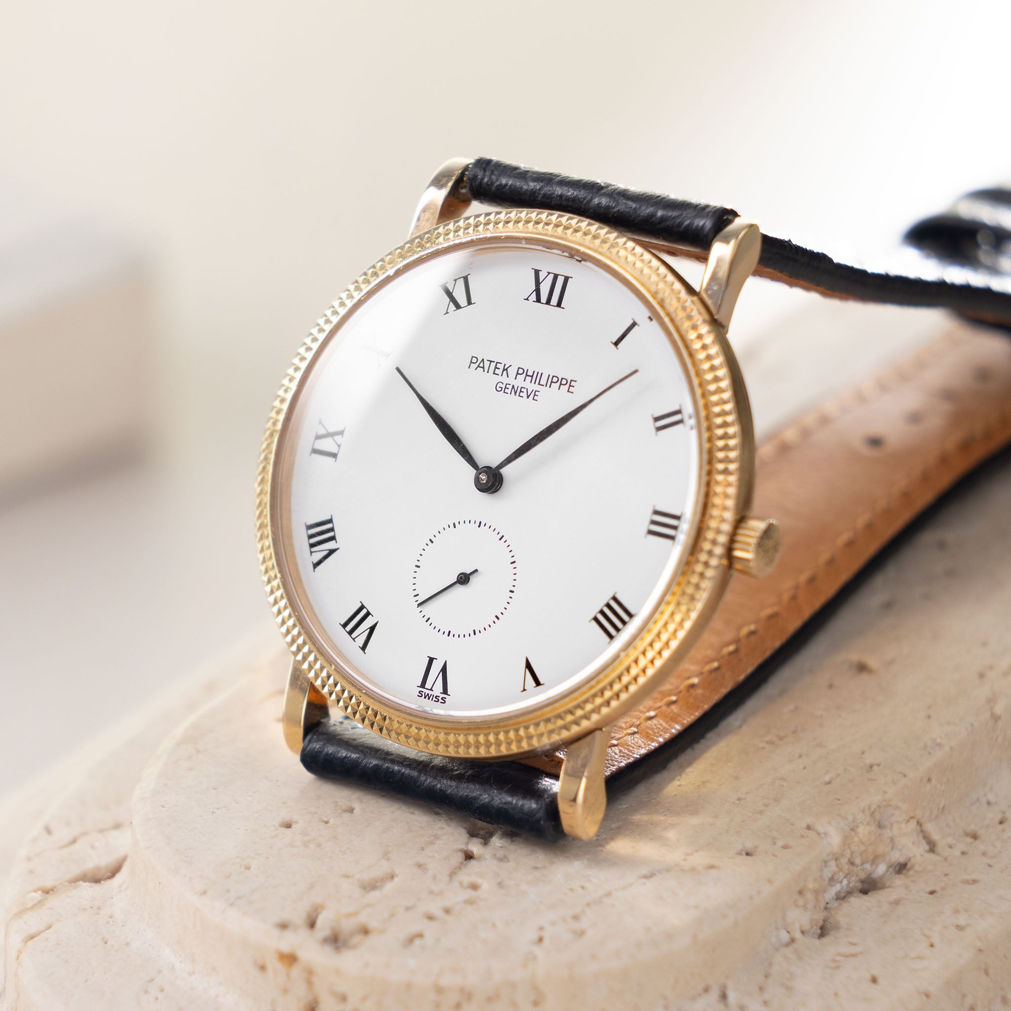 Patek Calatrava Porcelain dial , Clous de Paris 18k yellow gold case with extract from the archives ref 3919