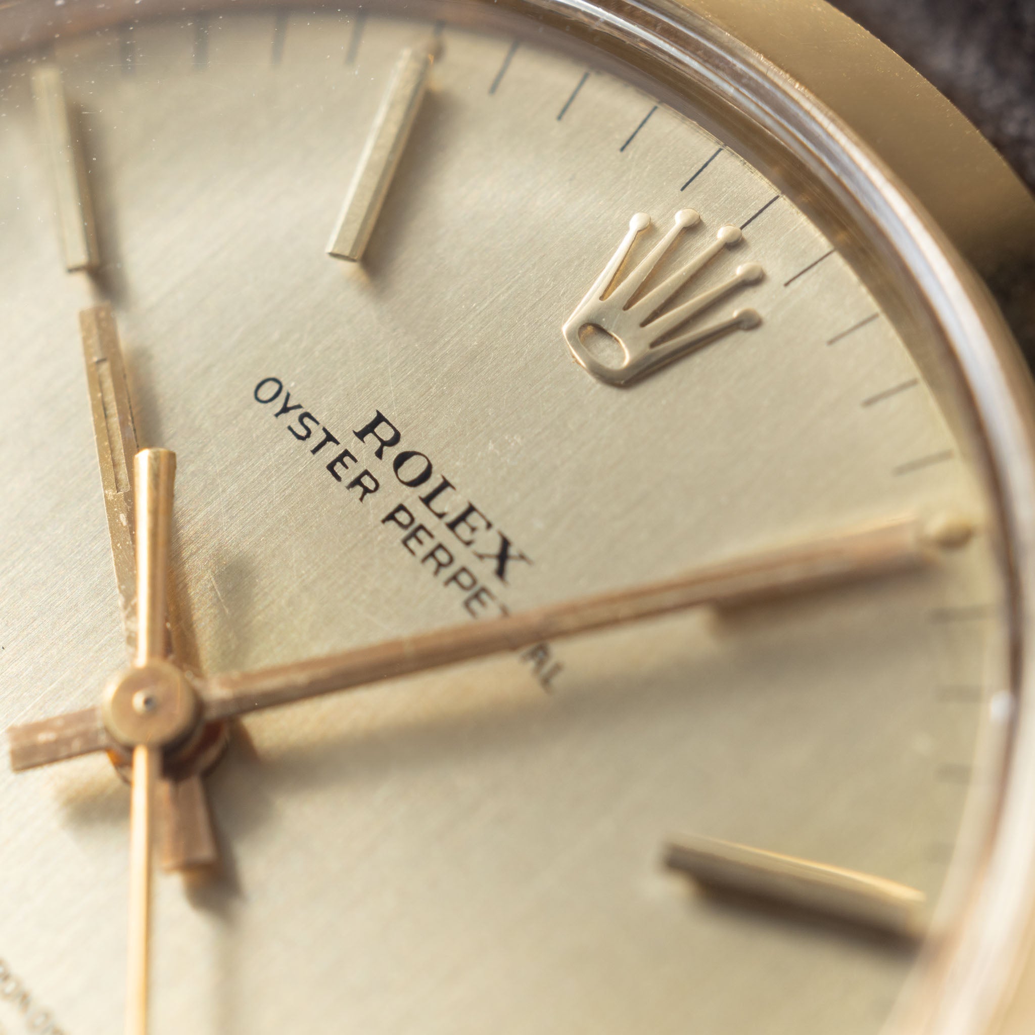 Rolex Oyster Perpetual 1002 Vertical Brush Champagne Dial in 18k Yellow Gold