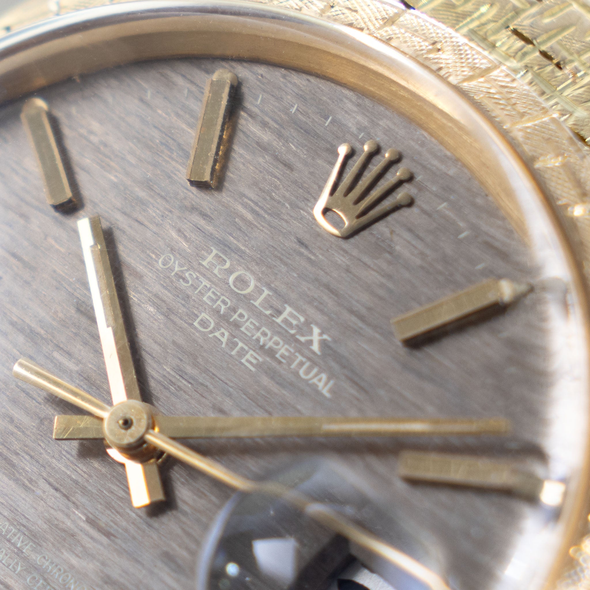 Rolex Oyster Perpetual Date 1504 Grey Shantung Dial Moreau Finish with Brick Bracelet in 18k Yellow Gold