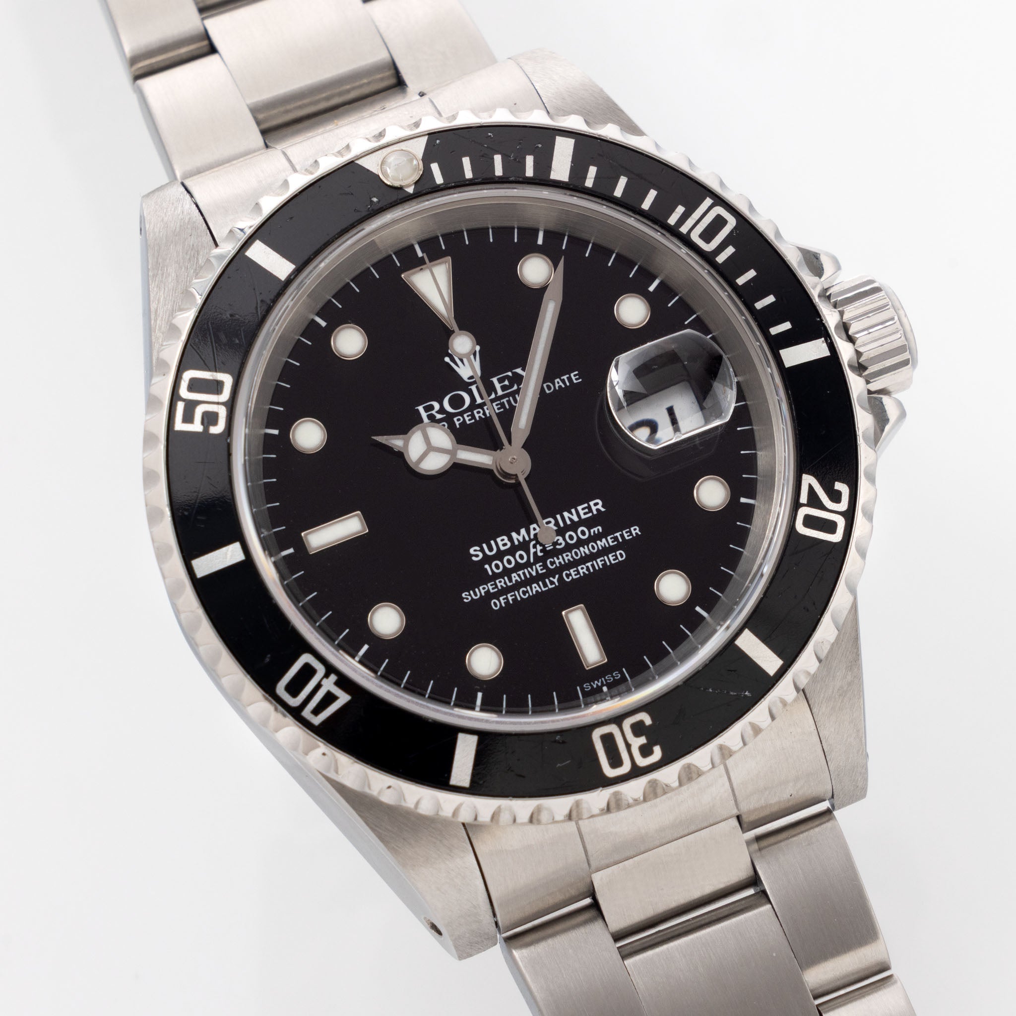 Rolex Submariner Date 16610 Swiss Only Dial with Original Guarantee Paper