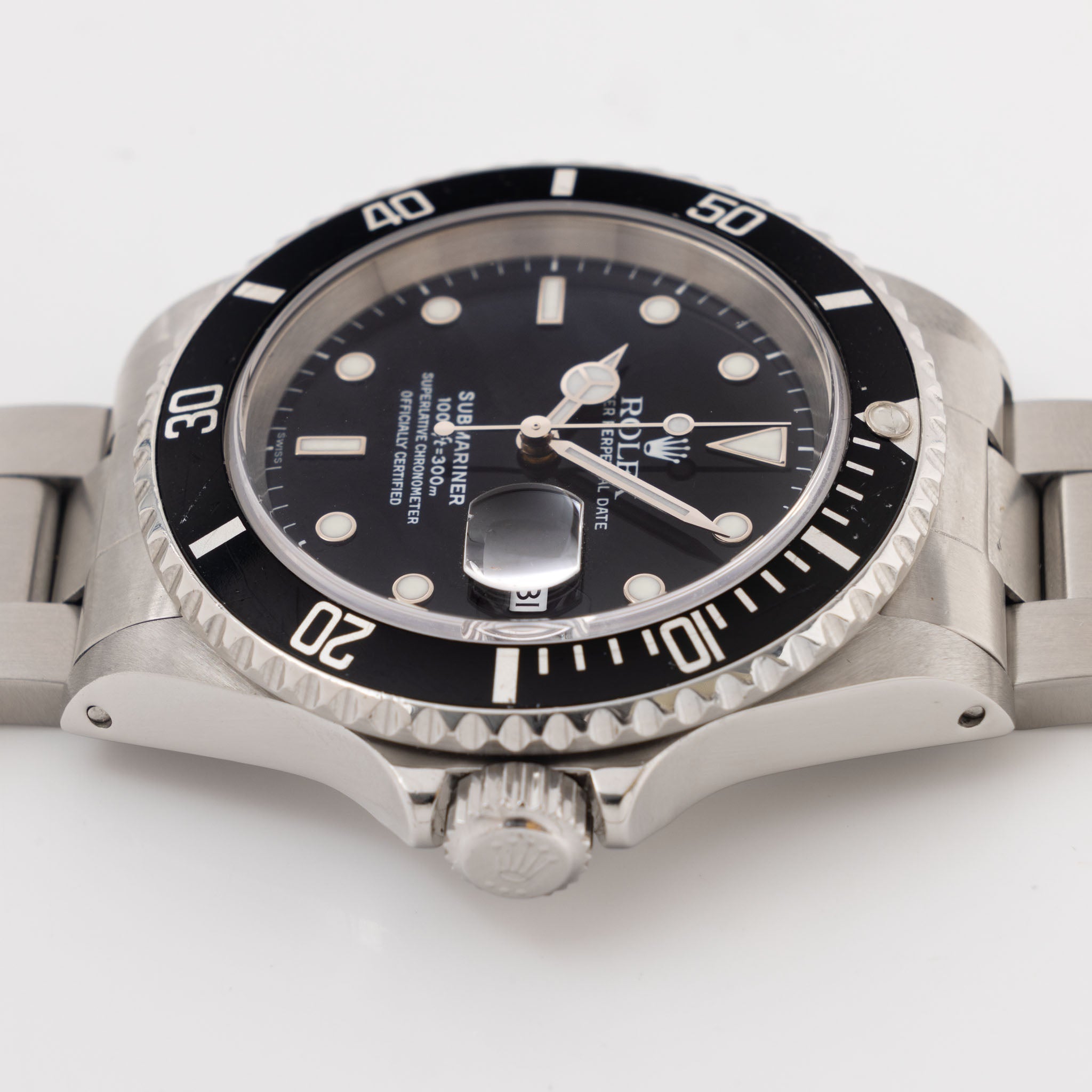 Rolex Submariner Date 16610 Swiss Only Dial with Original Guarantee Paper