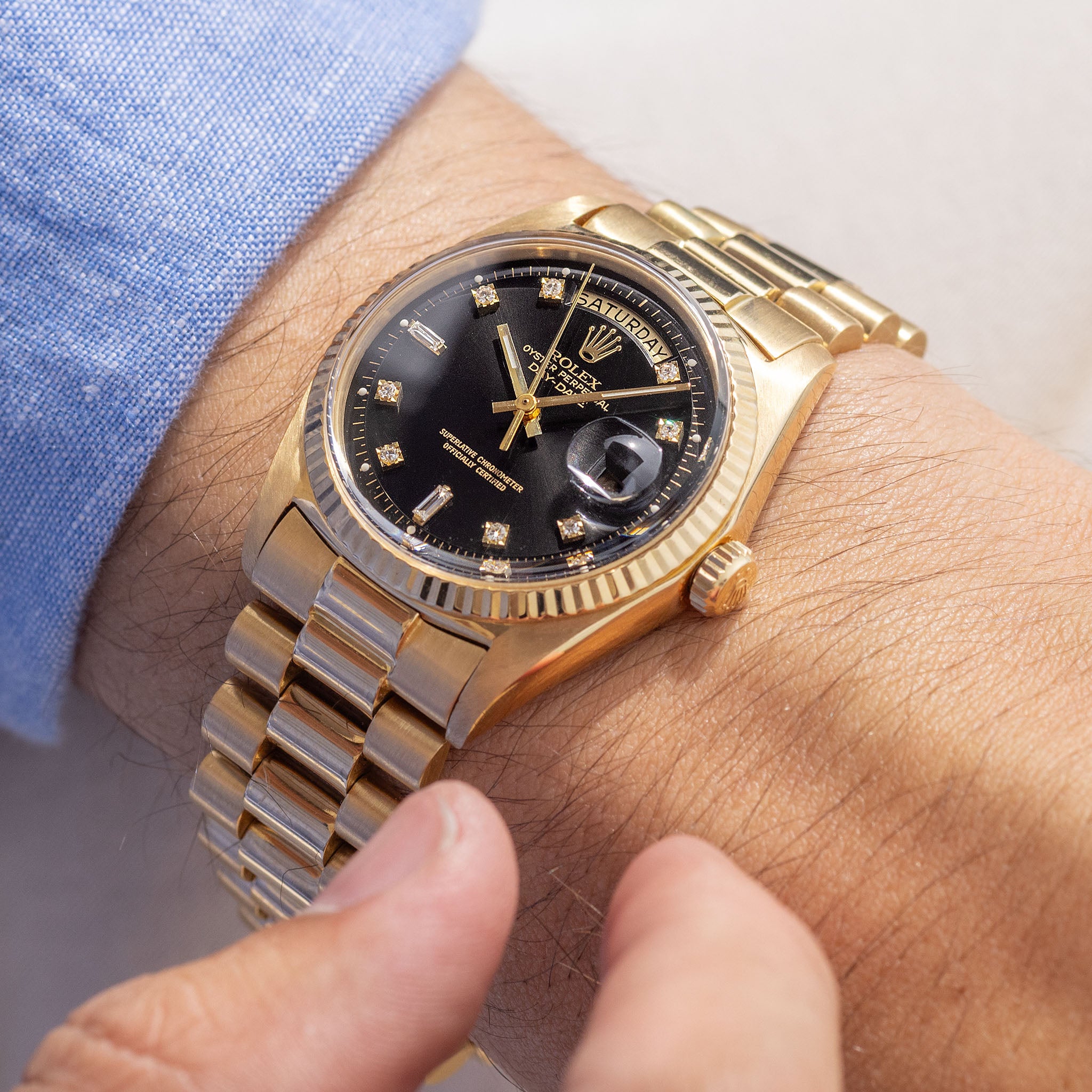 Rolex day date discount yellow gold black dial