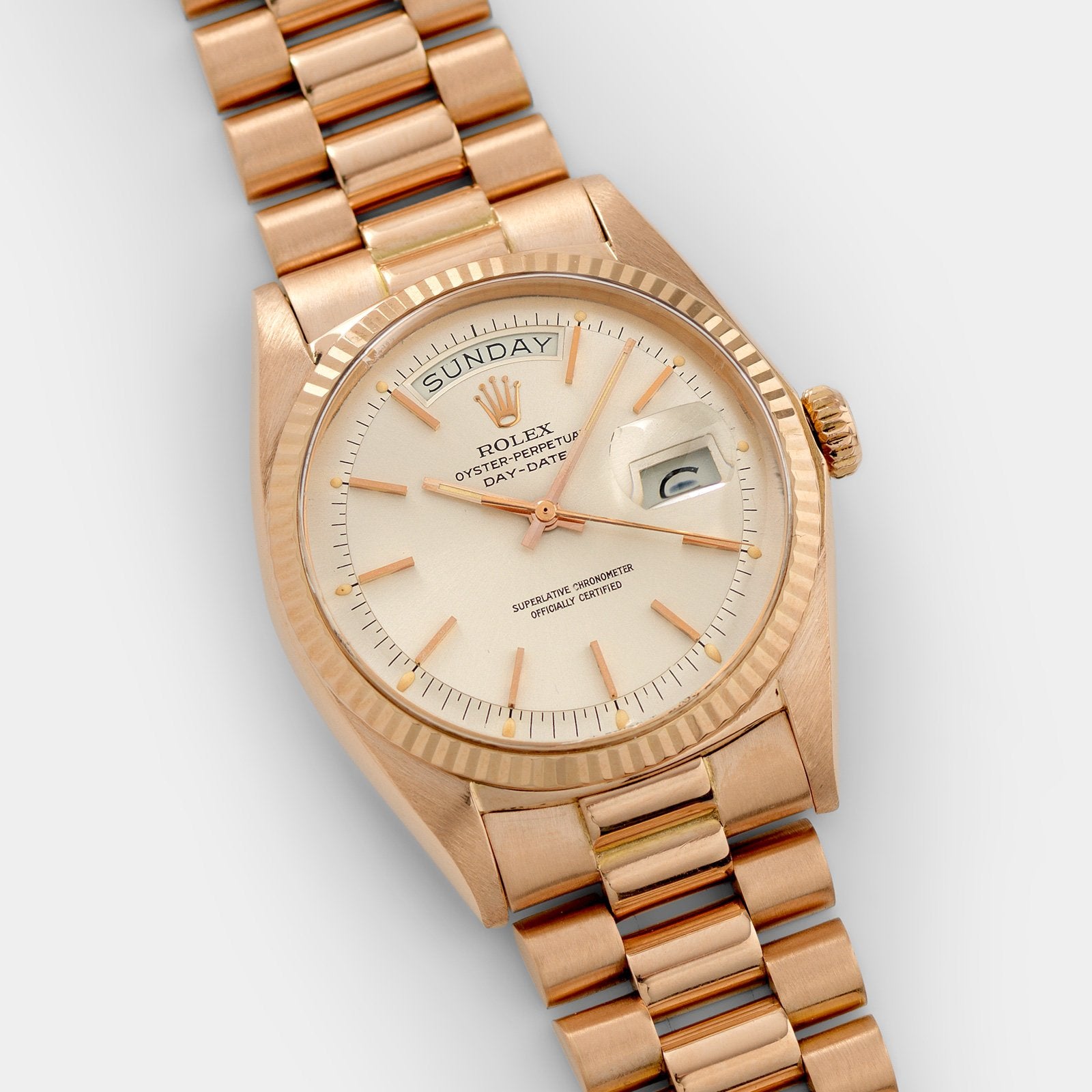 Rolex day date hot sale silver and gold