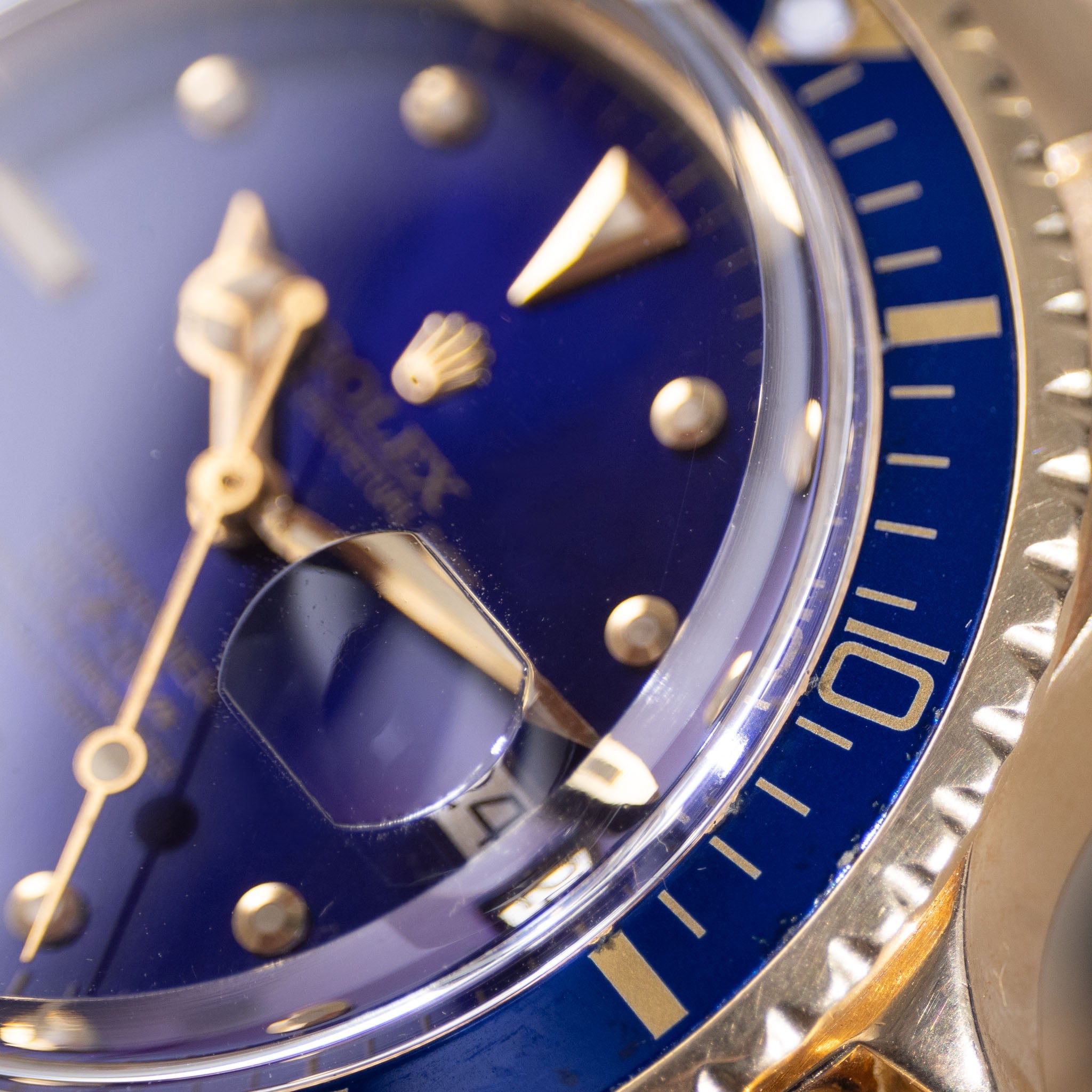 Rolex Submariner 1680/8 in 18k Yellow Gold with Blue "Nipple" Dial Turned Purple