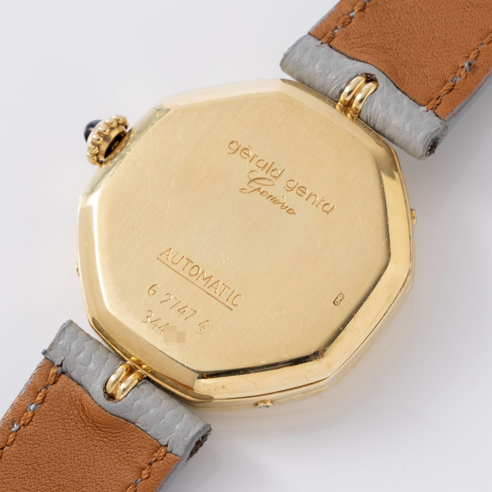 Gerald Genta “Succes“ Day Date Moon-Phase Cream Dial in 18 k yellow gold ref G2747 43