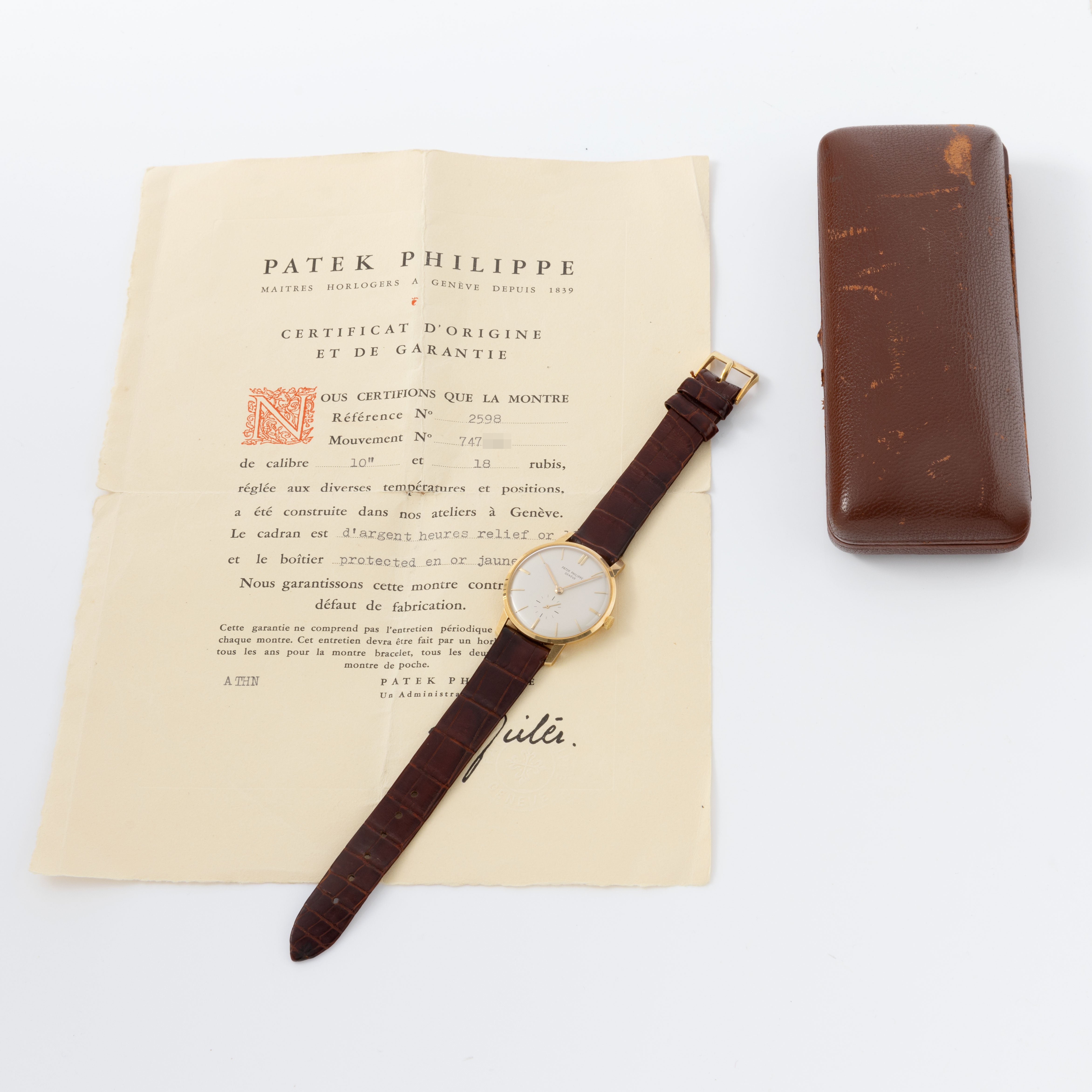 Patek Philippe Calatrava in 18 k yellow gold ref 2598 New old stock condition with box and original Paper