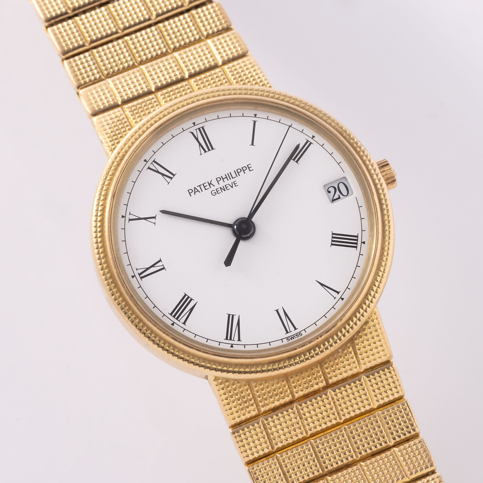 Patek Philippe Calatrava Automatic White Dial in 18k Yellow Gold Ref. 3802J with Integrated Bracelet