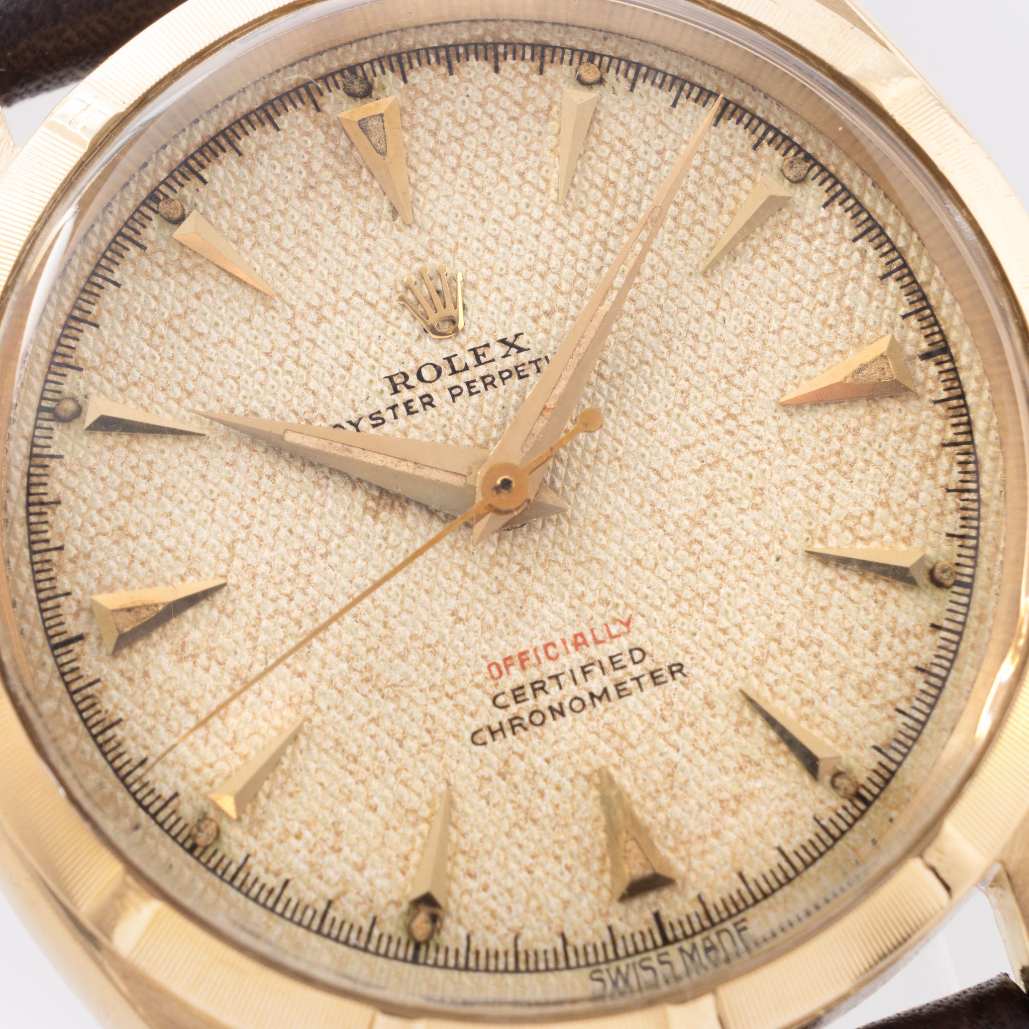 Rolex Oyster-Perpetual 6285 with Honeycomb Red Writing Dial in 18K Yellow Gold and Original Warranty Papers