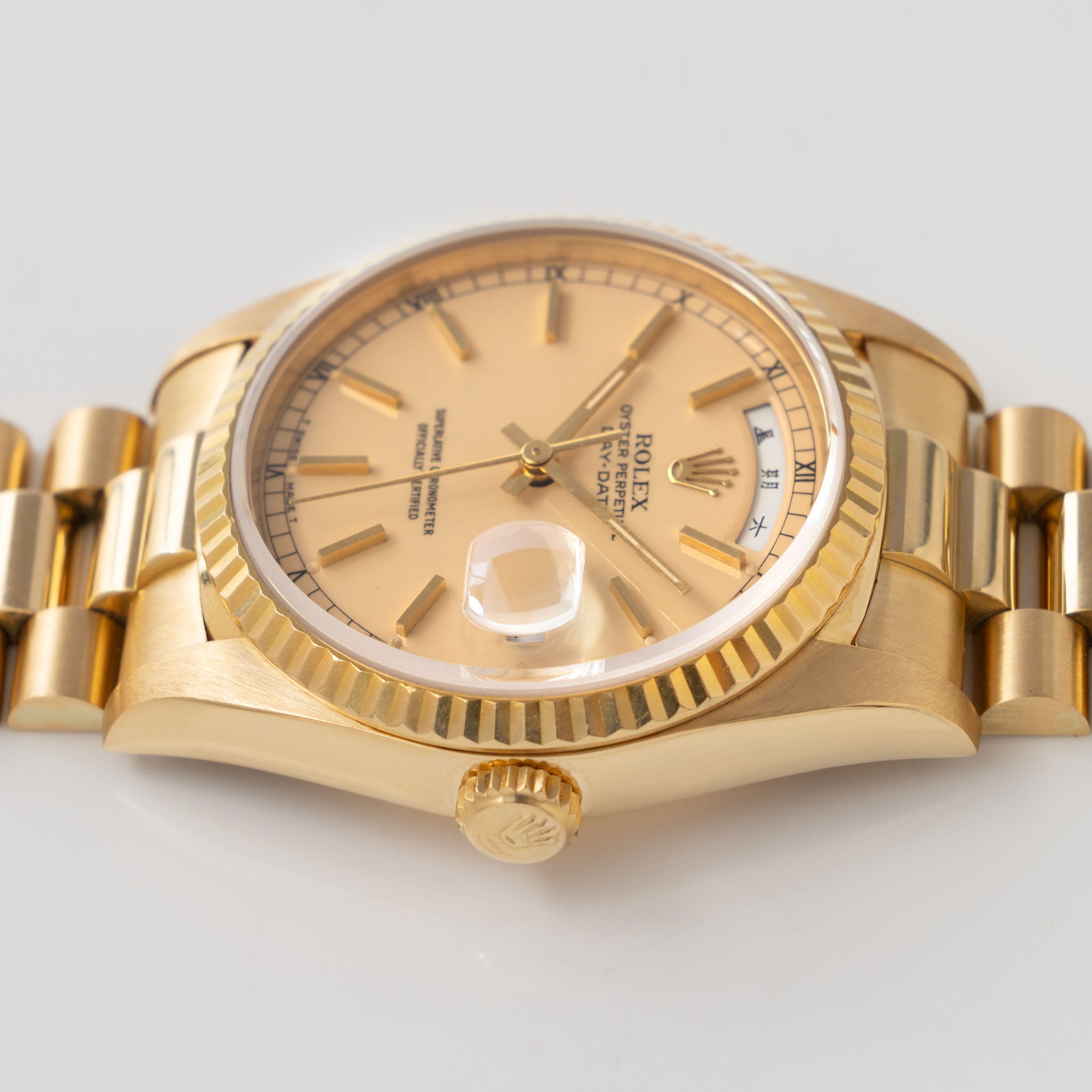 Rolex Day-Date 18238 rare Apricot Stella Dial with Original Guarantee paper in 18k yellow