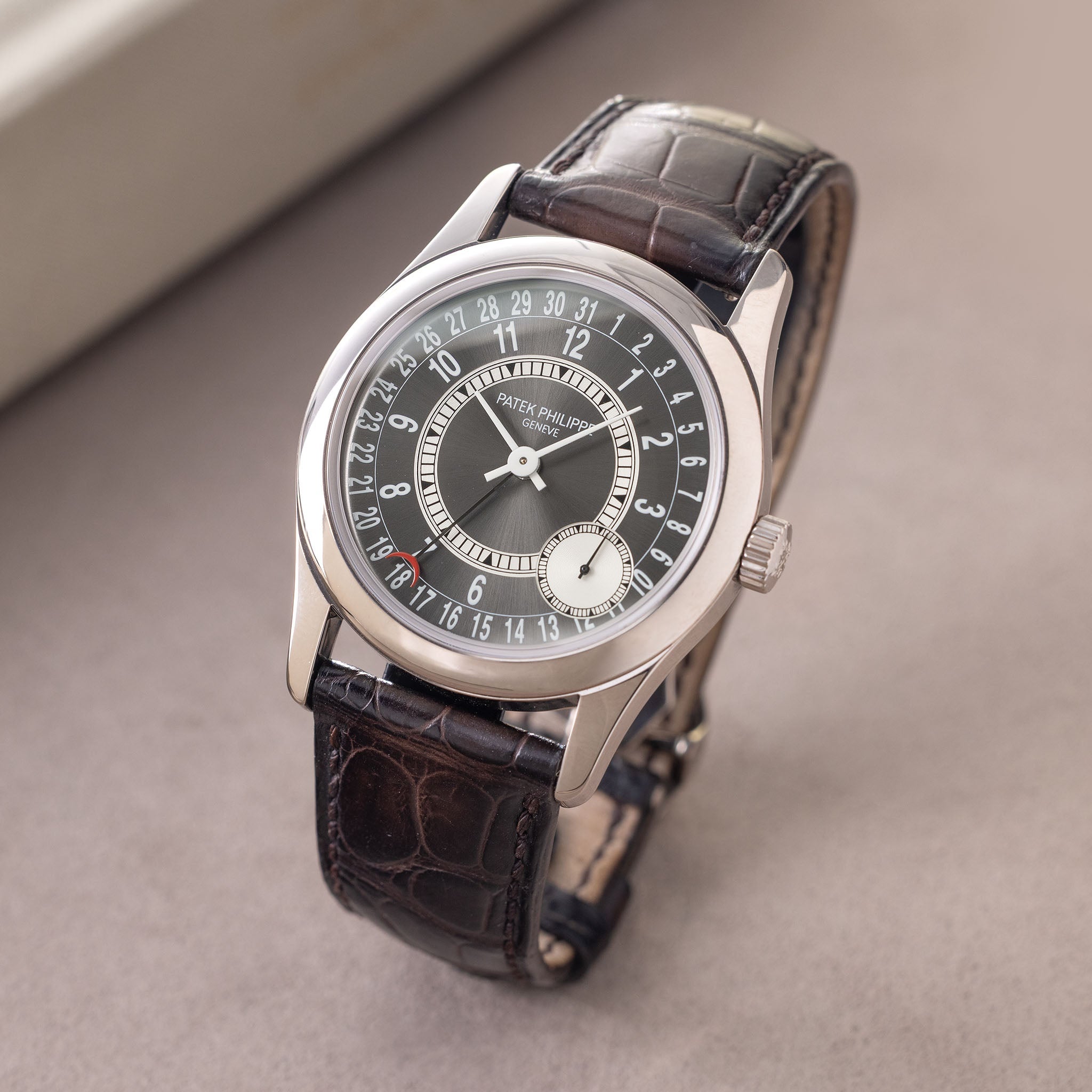 Patek Philippe Calatrava ref. 6000-010G in 18k White Gold Grey Sunburst Dial