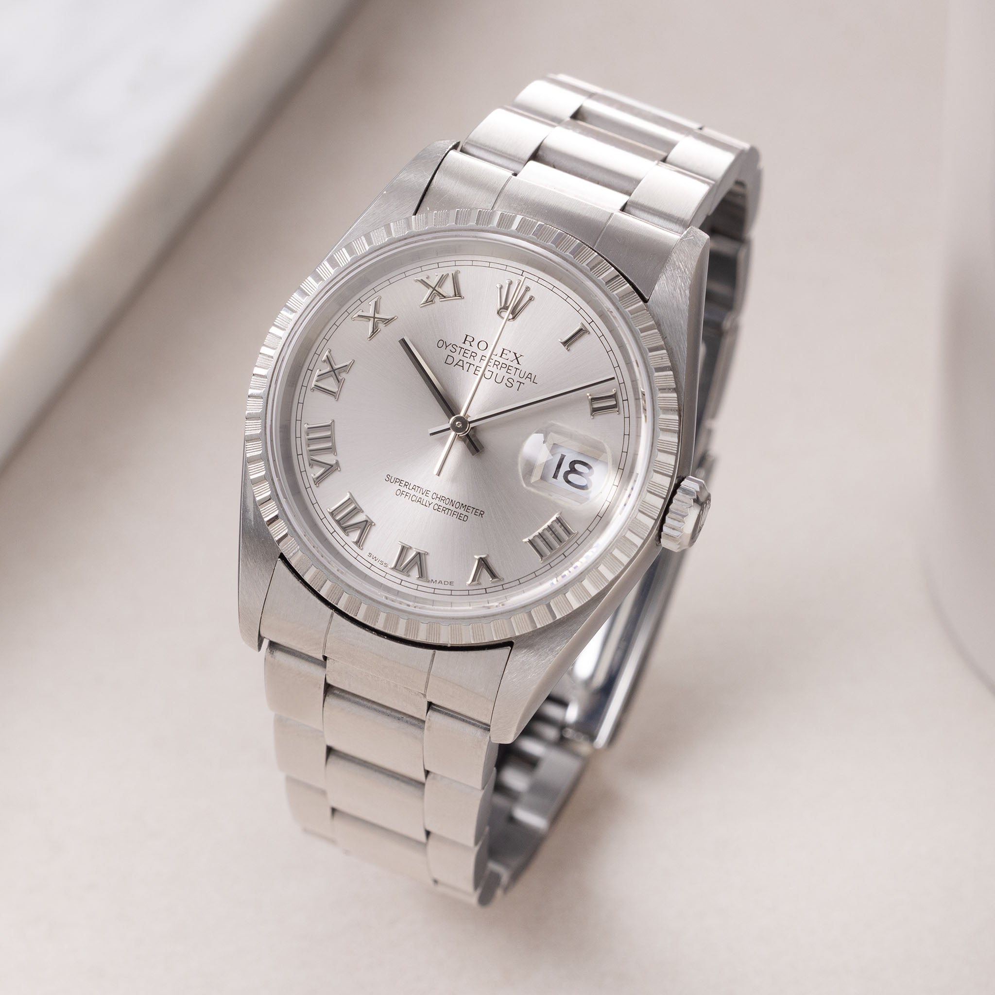 Rolex Datejust 16220 Silver Roman Dial with Original Papers
