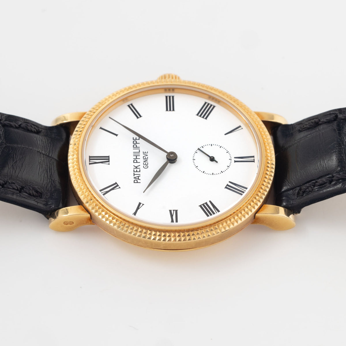 Patek Philippe Calatrava Ref 7119J 18k Yellow Gold Clous de Paris with White Roman Dial