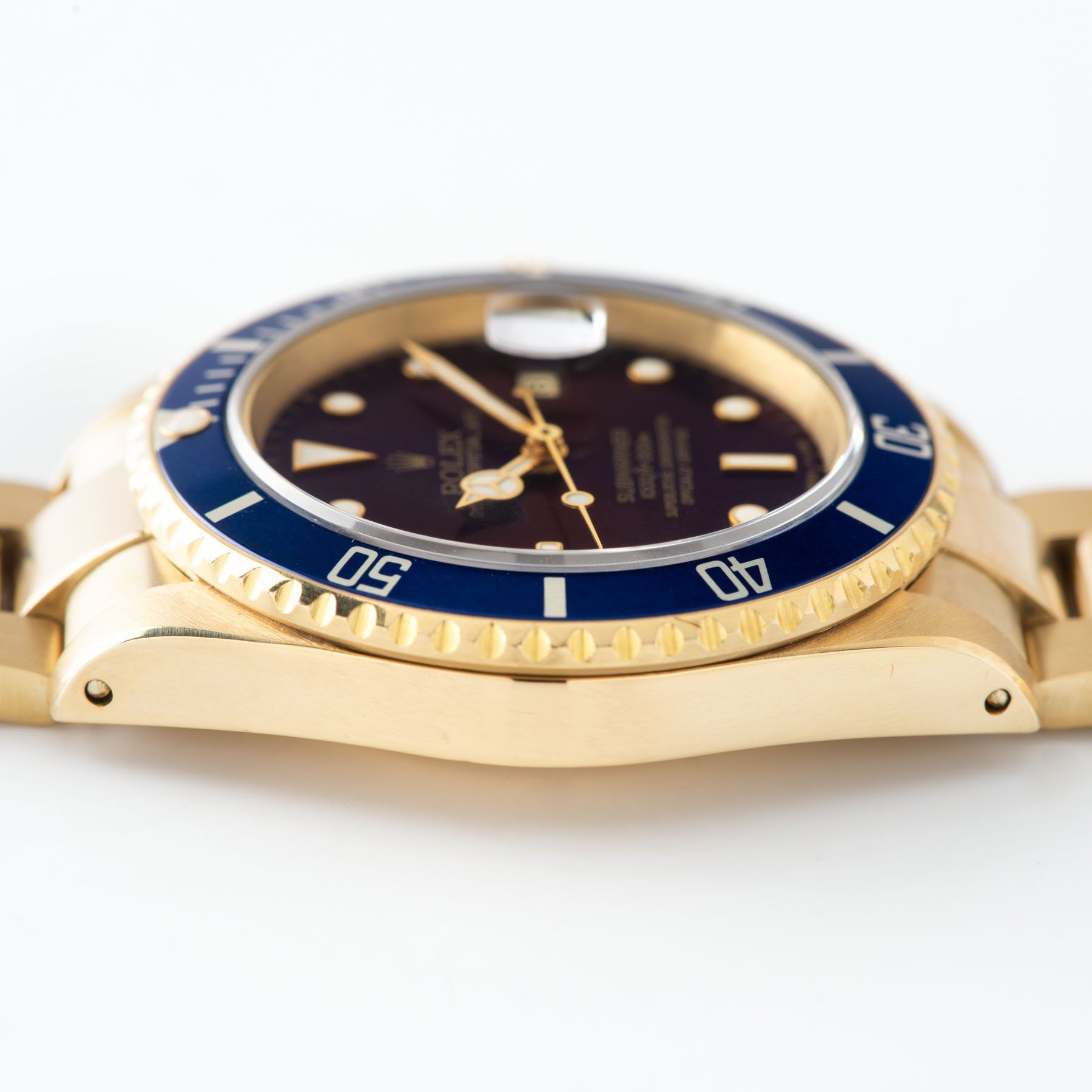 Rolex Submariner Date Purple Dial Yellow Gold 16618case details