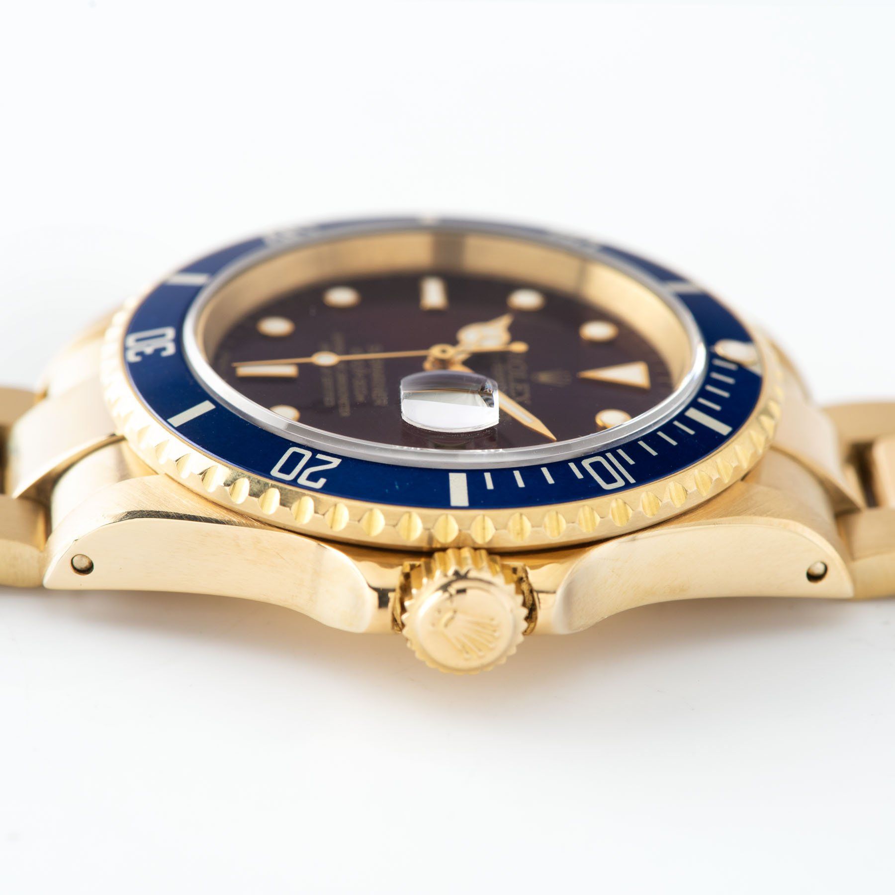 Rolex Submariner Date Purple Dial Yellow Gold 16618 case details
