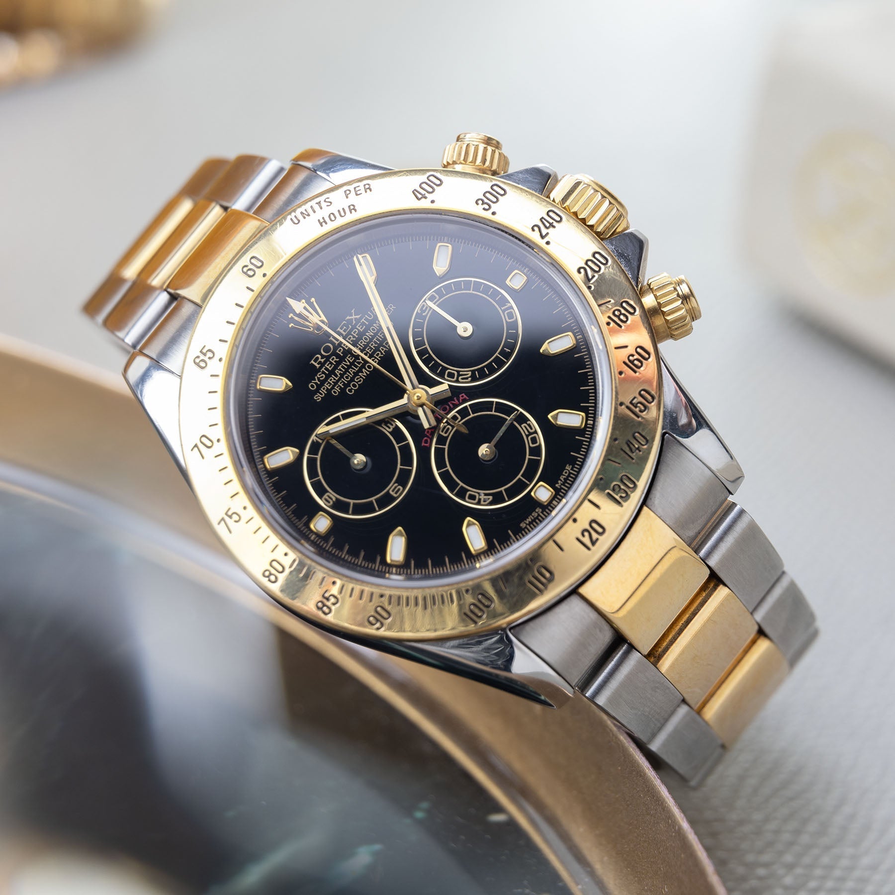 Rolex daytona steel sale gold black dial