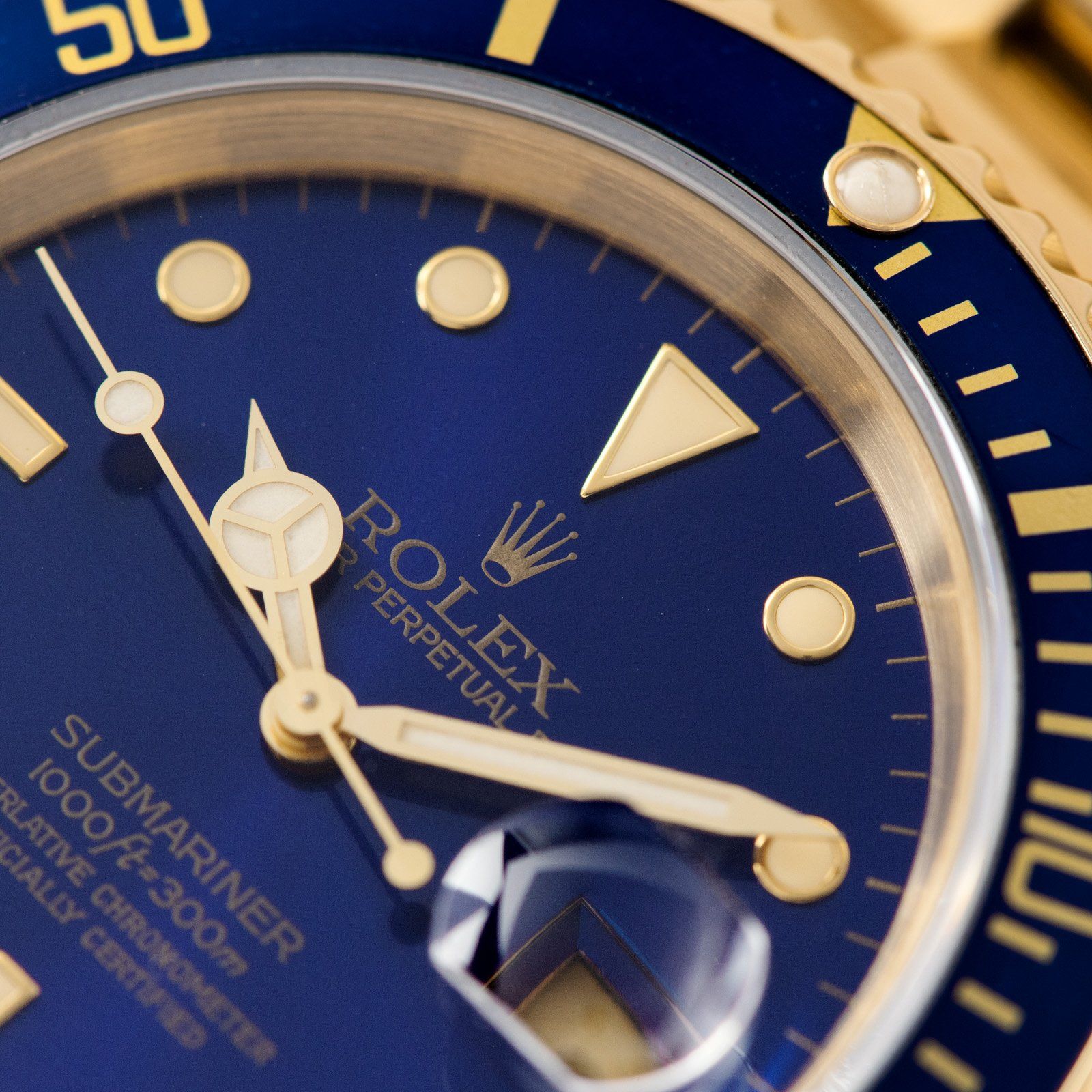 16618 Rolex Submariner Blue Dial Mens 18K Gold Watch